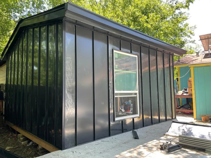 Black standing seam metal wall panels for Metal Roof Installation in Norwalk